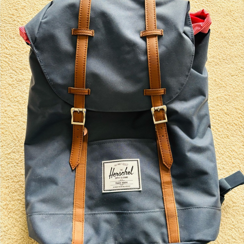Herschel Supply Company Heritage Backpack in Navy with red stripe lining.